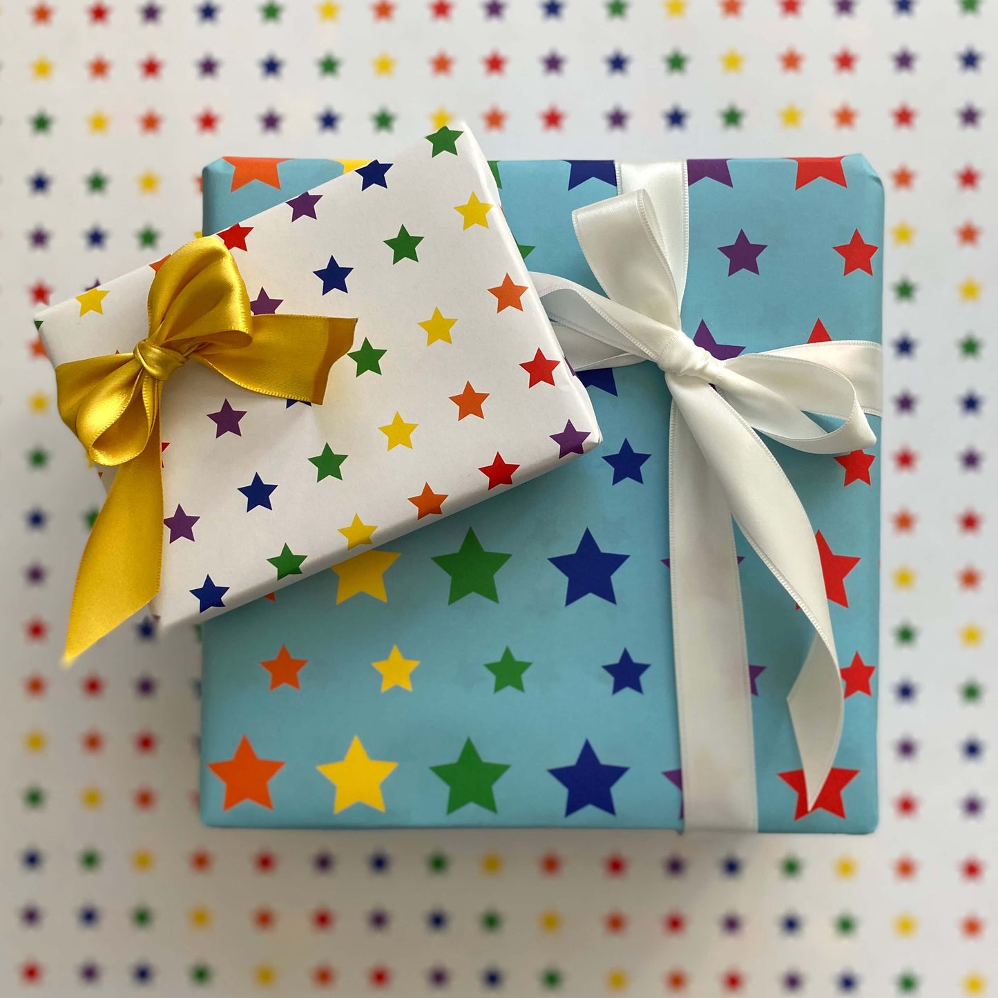 Rainbow Stars Wrapping Paper: Rolls of 3 Sheets (Case of 3 Rolls)