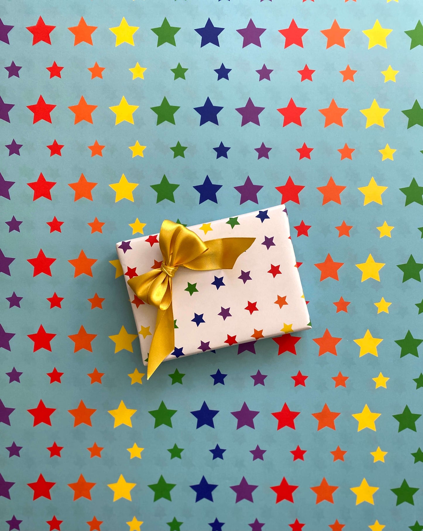 Rainbow Stars Wrapping Paper: Rolls of 3 Sheets (Case of 3 Rolls)