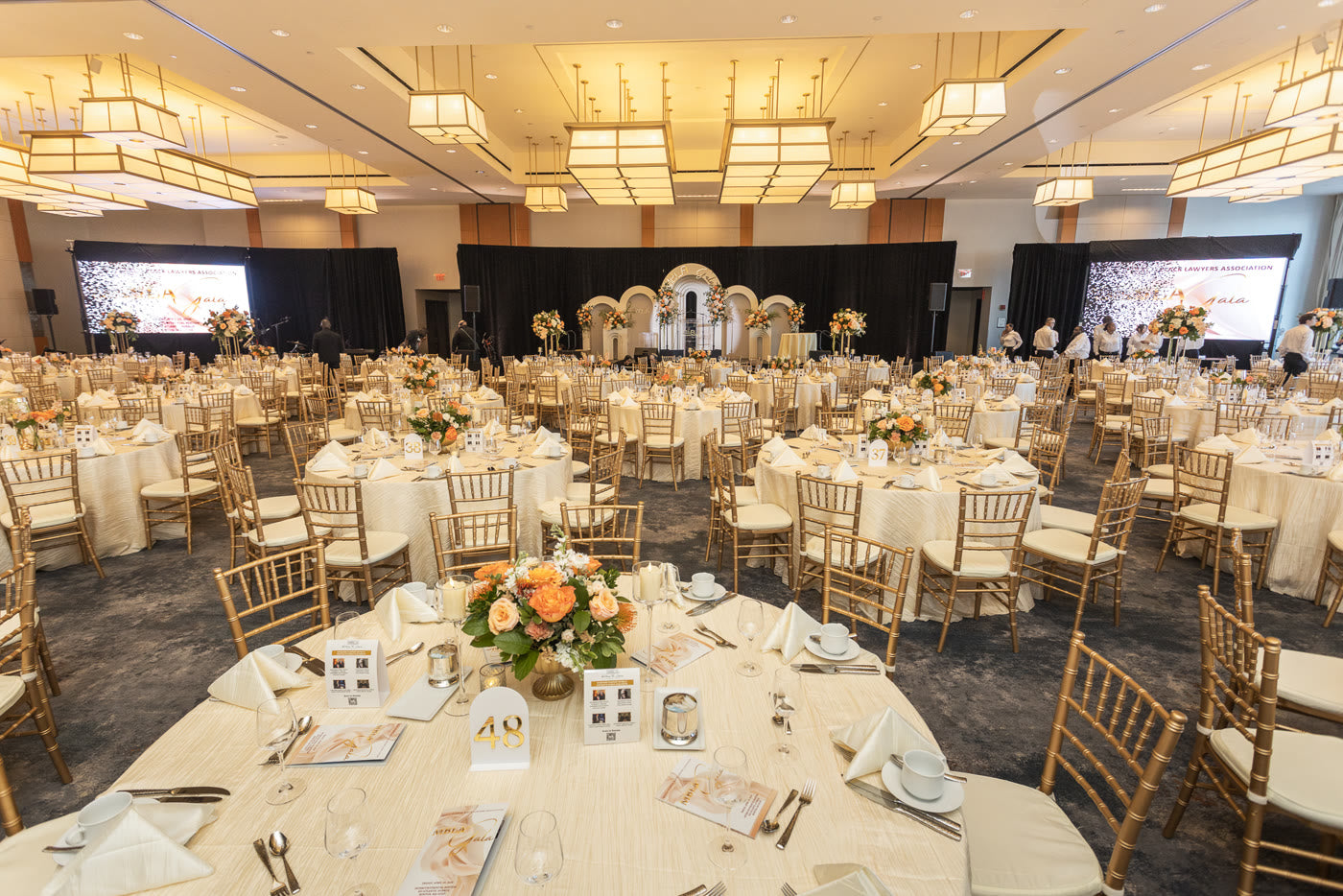 The MBLA gala ballroom — arches and peach centerpieces