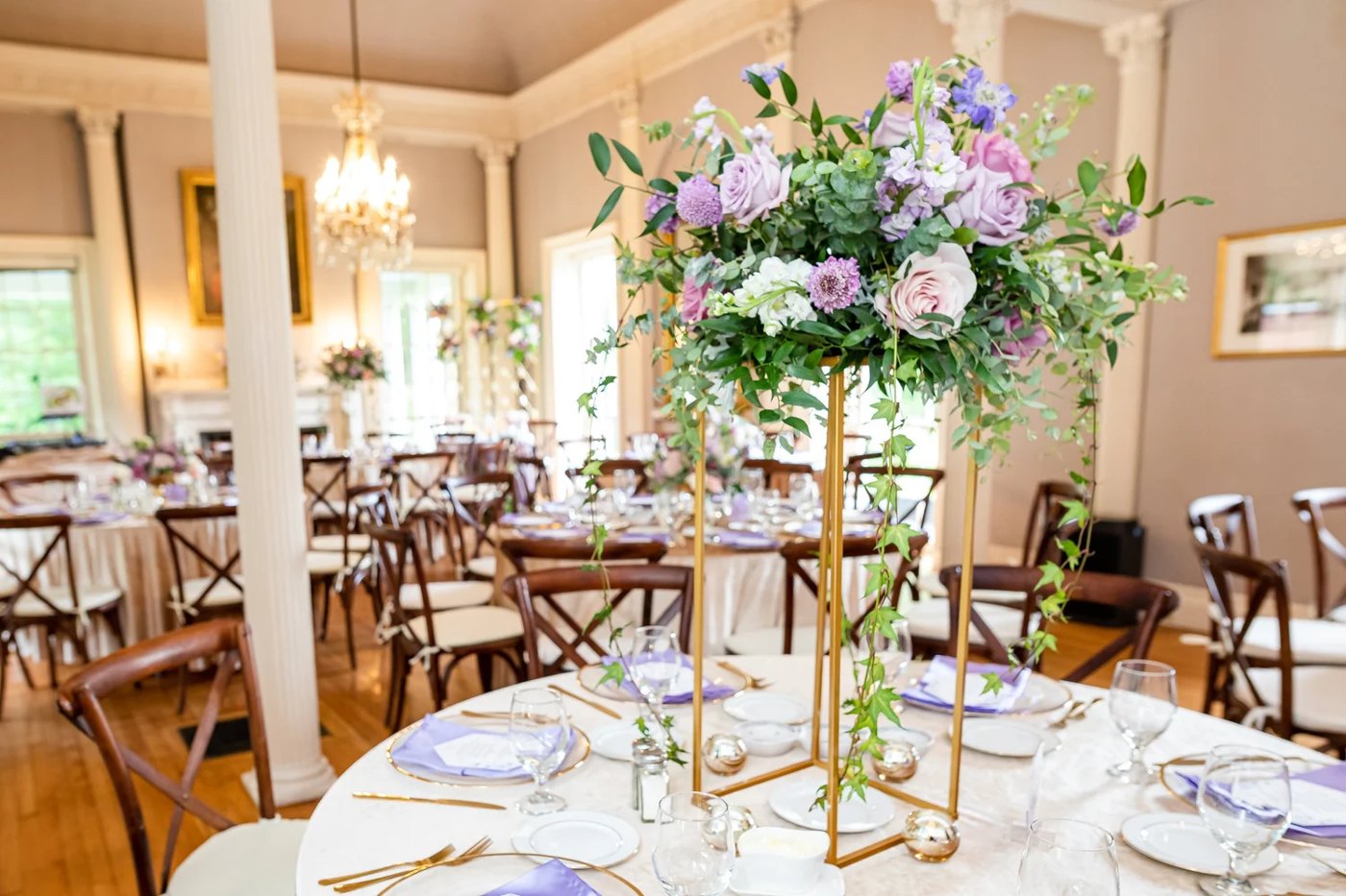 Lilac and lavender centerpiece in the estate room