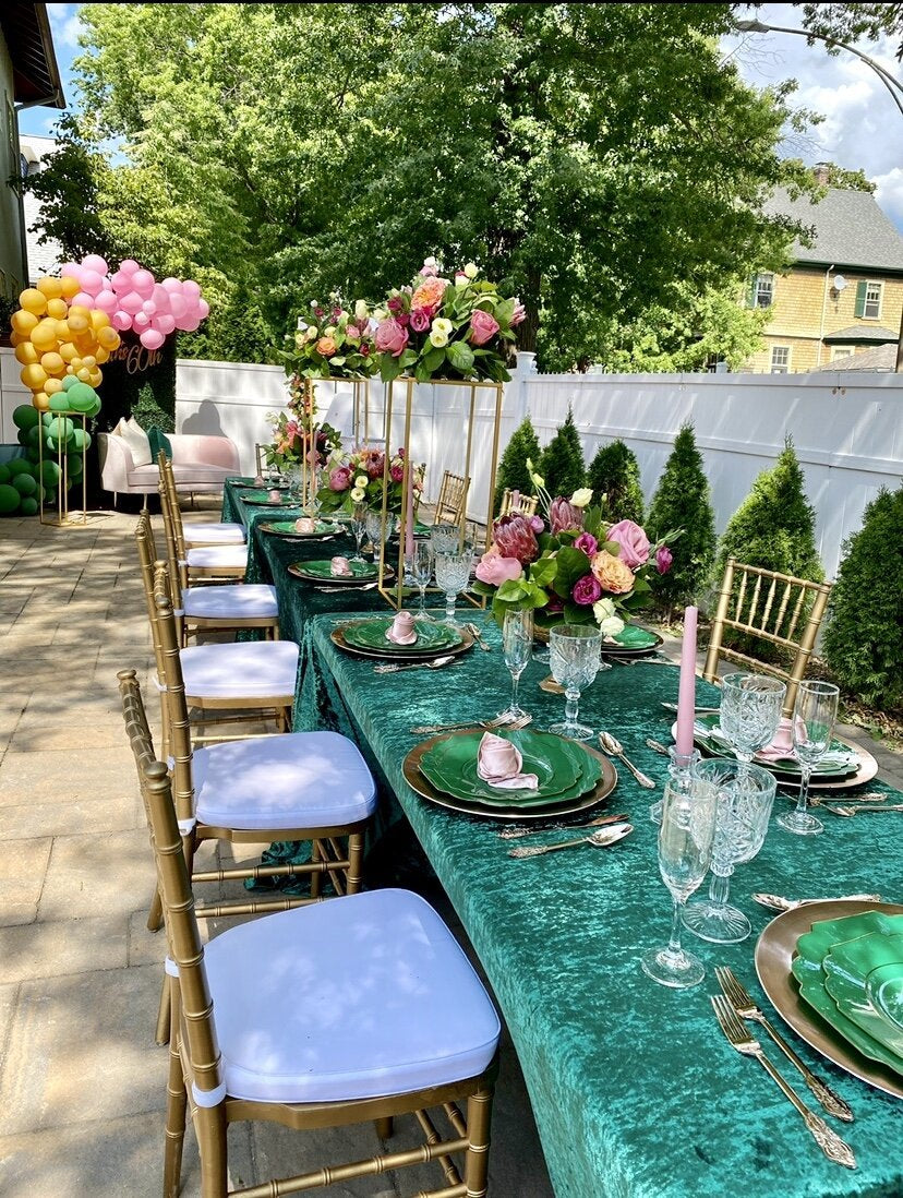 The long emerald tablescape in the backyard