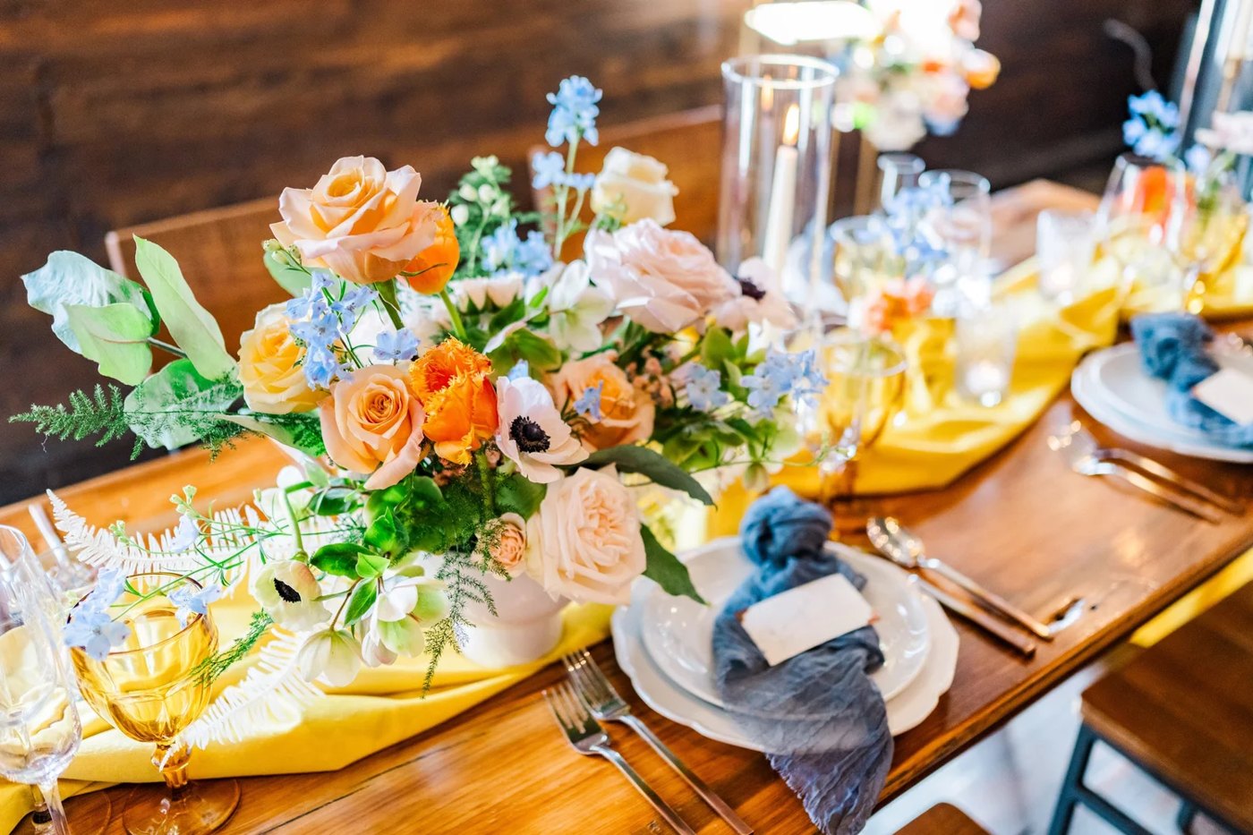 Peach and dusty-blue tablescape on barnwood