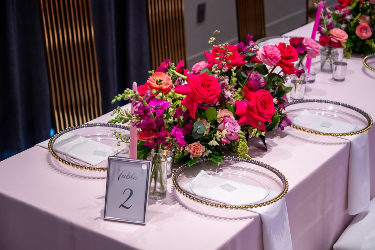 Jewel-toned tablescape in fuchsia and magenta