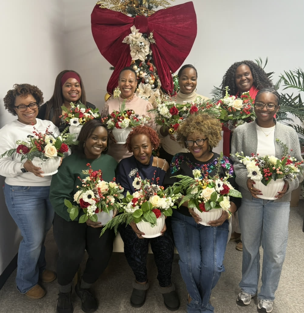 A private holiday workshop group with finished centerpieces
