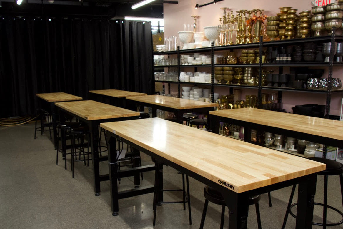 The workshop studio — workbenches and shelves of vases